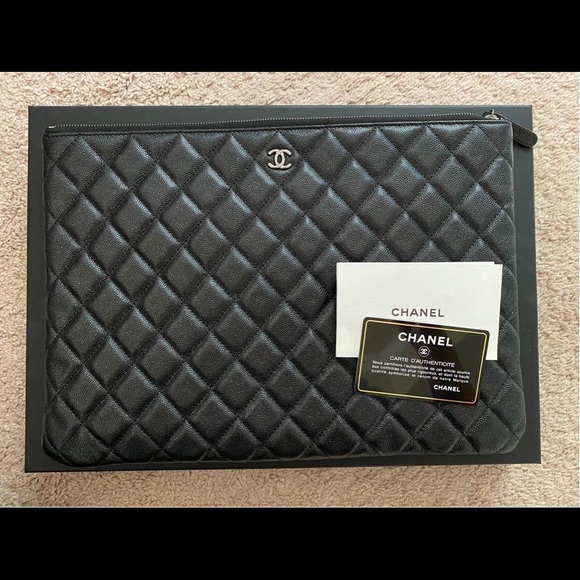 CHANEL Handbags - CHANEL Caviar Large Diamond Quilted O-Case CLUTCH